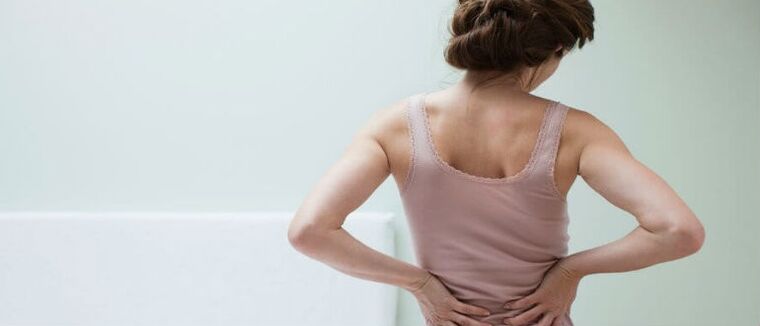 The spine osteochondrosis in a woman