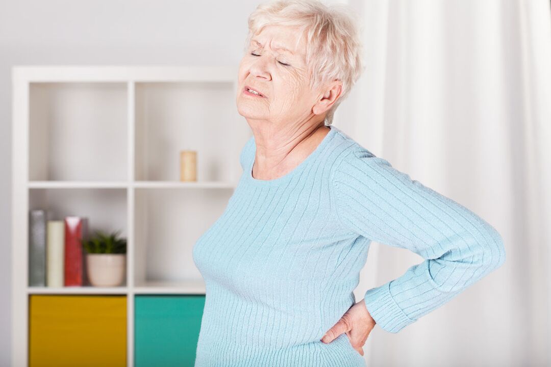 a woman’s lower back pain can be the cause of osteochondrosis